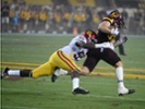 Former USC linebacker files wage suit