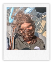 Person with their hair messed up and covering their face