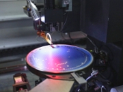 BINZHOU, CHINA - JANUARY 28: A robotic hand performs semiconductor chips packaging at Shandong NEM Semiconductor Co., Ltd. on January 28, 2026 in Binzhou, Shandong Province of China. (Photo by Guo Zhihua/VCG via Getty Images)