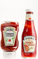 Chico, California, USA - April 26,2011 : Close up of a 14 Oz plastic upside down bottle of Heinz Tomato ketchup sitting next to a 14 OZ limited edition collectors bottle of Heinz Tomato Ketchup.