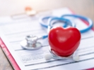 Health insurance concept,Cost of health care concept, stethoscope and calculator on document
