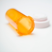 Select focus of an empty prescription pill bottle