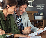 Couple looking at a paper
