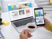 Woman checking the order on her digital ecommerce Shop Website while drinking coffee Small business online work from home