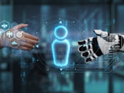 This image captures a symbolic interaction between a human hand and a robotic hand, representing the collaboration between humanity and technology in modern business environments. Auvana