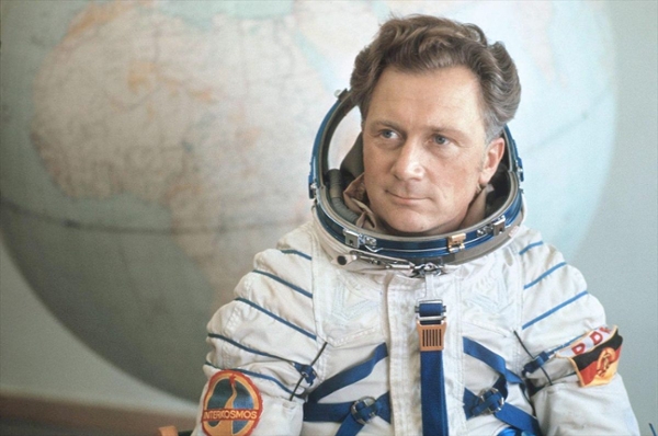 a man in a white spacesuit
