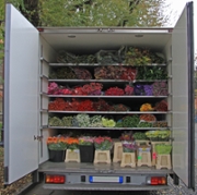 lorry body with bunches of flowers, Milan