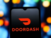 CANADA - 2025/10/17: In this photo illustration, the DoorDash (Door Dash) logo is seen displayed on a smartphone screen. (Photo Illustration by Thomas Fuller/SOPA Images/LightRocket via Getty Images)