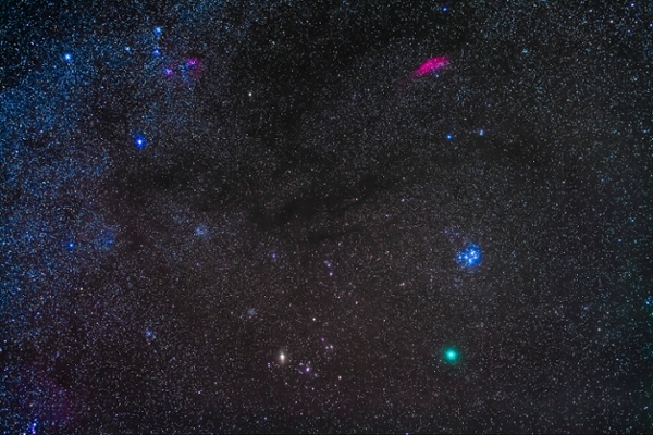Comet Wirtanen 46P in Taurus: below the Pleiades (M45), and to the west (right) of the Hyades with yellow Aldebaran at bottom. The California Nebula in Perseus is at top, as are the Taurus Dark Clouds. The comet was nearly at its closest point to Earth and at its brightest. This is a stack of 5 x 2-minute exposures with the Sigma 50mm lens at f/2.8 and filter-modified Canon 5D MkII at ISO 800, on the Star Adventurer tracker, taken December 14/15 as the skies cleared in the Chinook winds of southern Alberta. Star glows added with Orton effect in Luminar. (Photo by: Alan Dyer/VW PICS/Universal Images Group via Getty Images)