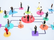 Business professionals interact and network in a structured environment, sharing ideas and enhancing relationships within a corporate setting. This event promotes collaboration and growth.