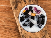 A bowl of Chinese herbal fruit traditional sweetsGrass jelly,