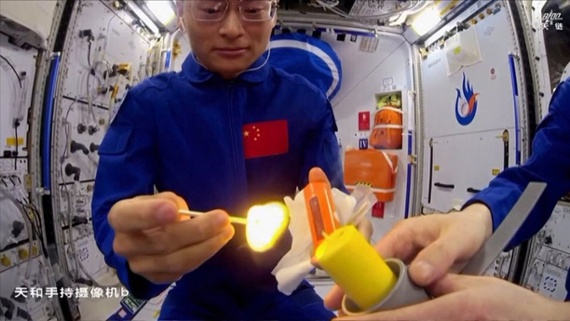 Watch astronauts light a match on Chinese space station