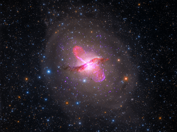 Scientists watch a galaxy's supermassive black hole shoot out the galaxy's gas