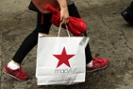 Macy's boosts hourly pay, adds college education benefit