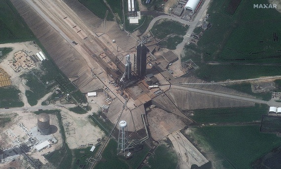 SpaceX Falcon Heavy seen from space on launch pad