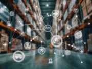 A network of logistics and supply chain icons superimposed over a blurred warehouse, illustrating interconnected systems, transportation, and global distribution.