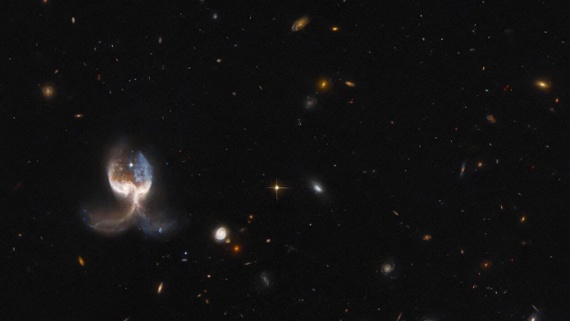 Stunning Hubble Space Telescope image shows 'galactic wings' from ongoing collision