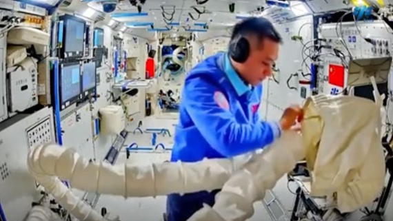 Chinese astronauts check out newly delivered supplies