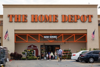 SAN DIEGO, CALIFORNIA - OCTOBER 10: The Home Depot logo is displayed on a sign outside one of their stores on October 10, 2025 in San Diego, California. (Photo by Kevin Carter/Getty Images)