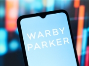 CANADA - 2025/05/21: In this photo illustration, the Warby Parker logo is seen displayed on a smartphone screen. (Photo Illustration by Thomas Fuller/SOPA Images/LightRocket via Getty Images)