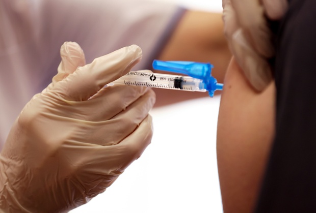 Employers are mandating vaccines. What are the risks?