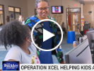 STEM professionals helps students in Operation Xcel