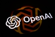 The OpenAI logo is displayed on a smartphone screen placed on a reflective surface onto which the company logo is projected, in Creteil, France, on June 29, 2026. OpenAI announces the release of the latest update to its flagship language model. (Photo by Samuel Boivin/NurPhoto via Getty Images)