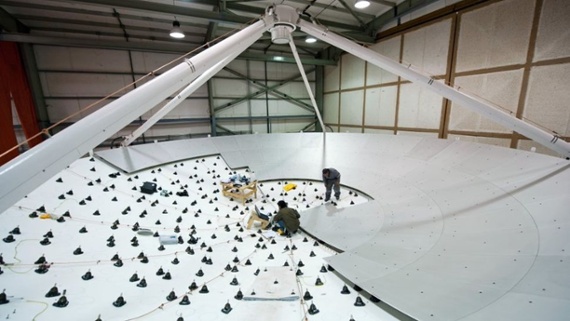 Image of day: Working on a 39-foot telescope dish