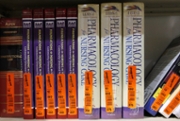 Textbooks sit on a shelf at the Chegg Inc. warehouse in Shepherdsville, Kentucky, U.S., on Thursday, April 29, 2010. No more $120 chemistry books. That's the message from textbook-rental service Chegg Inc., which is urging college students to stop paying top dollar to buy their tomes. Photographer: John Sommers II/Bloomberg via Getty Images