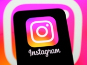 The Instagram logo is displayed on a smartphone screen with the app icon in the background, in Creteil, France, on May 15, 2026. A new ephemeral photo sharing feature is available on the Instagram app and via a standalone app. (Photo by Samuel Boivin/NurPhoto via Getty Images)