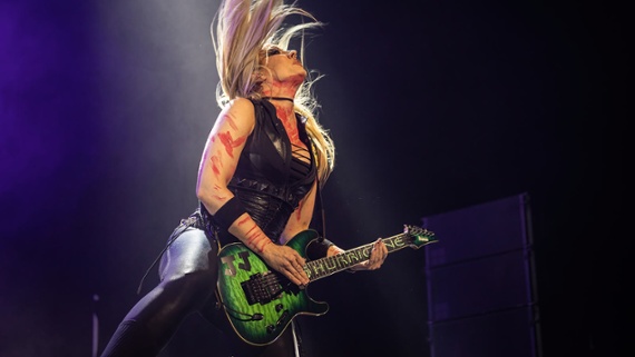 Learn the fiery playing style of Nita Strauss