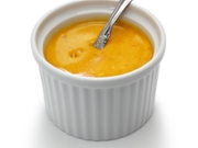 homemade rouille sauce in ramekin isolated on white background