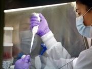 Dr. Lexi Duscher works in a lab at the Virginia Seafood Agricultural Research and Extension Center in Hampton, Virginia, Wednesday, Nov. 3, 2021. A Virginia Tech team is researching cellular agriculture to make the process of cultivated meat simple cheap and sustainable. (Jonathon Gruenke/Daily Press/Tribune News Service via Getty Images)