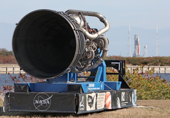 TOPSHOT - One of the massive RS-25 engines for NASA's Artemis II Space Launch System (SLS) rocket is displayed near the countdown clock at Kennedy Space Center in Cape Canaveral, Florida, on February 20, 2026. NASA performed their second wet dress rehearsal prior to sending four astronauts to the moon for the first time in more than 50 years. NASA officials said they are targeting March 6 for the crewed flight to the moon. (Photo by Gregg Newton / AFP via Getty Images)