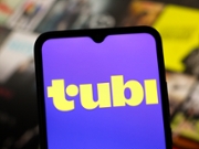 CANADA - 2025/06/20: In this photo illustration, the Tubi logo is seen displayed on a smartphone screen. (Photo Illustration by Thomas Fuller/SOPA Images/LightRocket via Getty Images)