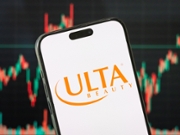 CHONGQING, CHINA - MAY 25: In this photo illustration, the logo of Ulta Beauty, Inc. is displayed on a smartphone screen, with the latest stock market chart of the company in the background, reflecting investor sentiment and recent trading activity, on May 25, 2025, in Chongqing, China. Ulta Beauty is a leading American beauty retailer offering cosmetics, skincare, haircare, and fragrance products, combining mass and prestige brands under one roof across its nationwide store network and online platform. (Photo Illustration by Cheng Xin/Getty Images)