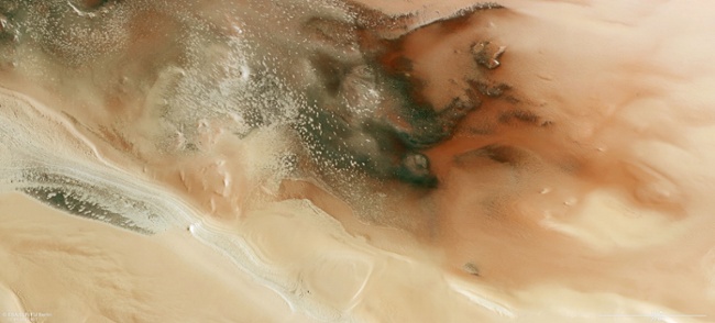 Mars orbiters spy 'cryptic terrain' near icy south pole