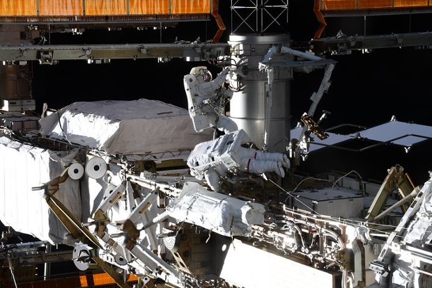 Astronauts prep space station for new solar array on first all-international spacewalk