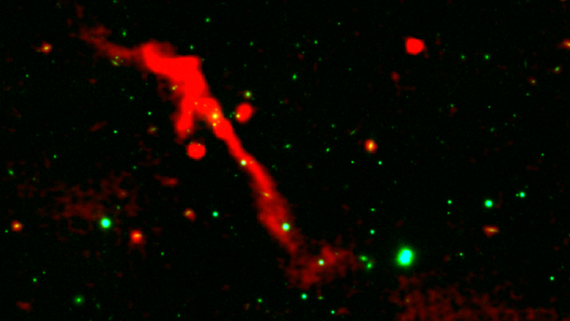 Reborn black hole erupts across a million light-years