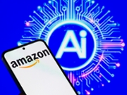 The Amazon.com logo is displayed on a mobile phone with artificial intelligence (AI) in the background, in this photo illustration in Brussels, Belgium, on October 28, 2025. (Photo Illustration by Jonathan Raa/NurPhoto via Getty Images)