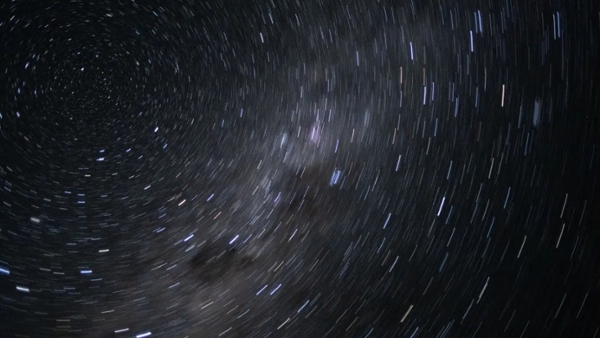 stars form swirling spiral in a timelapse photo