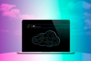 Laptop on desk with cloud and gears.Machine Learning