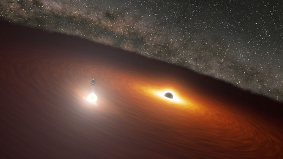 Gamma-ray flare reveals monster black hole is actually 2