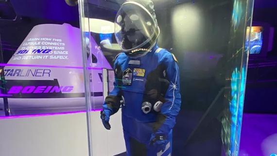 Boeing reveals new Starliner spacesuit with replica made by Adam Savage