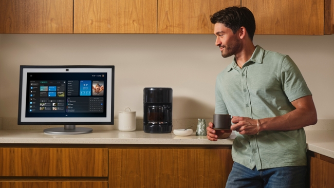 A man using an Amazon Echo Show