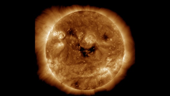 The sun's sinister 'smile' has Earth on solar storm watch this Halloween weekend