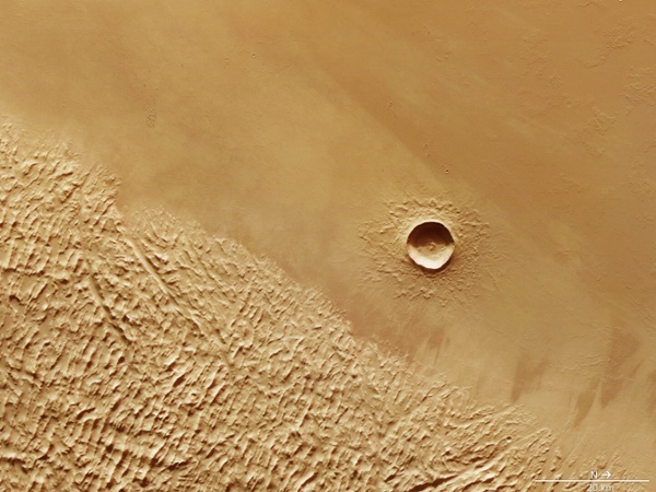 Landslides on Mars suggest water surrounded Olympus Mons
