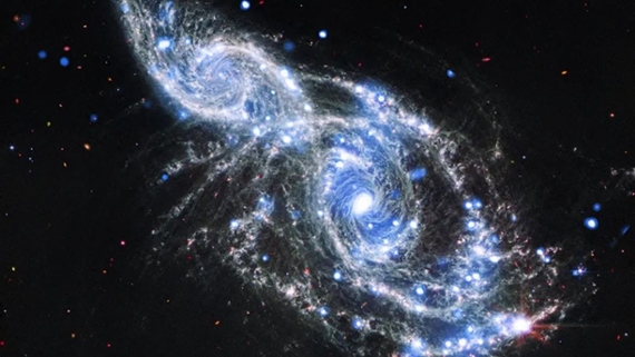 Photo of day: Space telescopes capture galactic hug