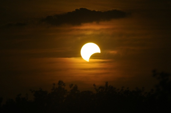 When is October's partial solar eclipse and who can see it?