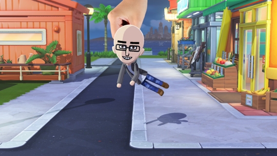Hand holding Wii character of Lance Ulanoff in the game Tomodachi Life: Living the Dream